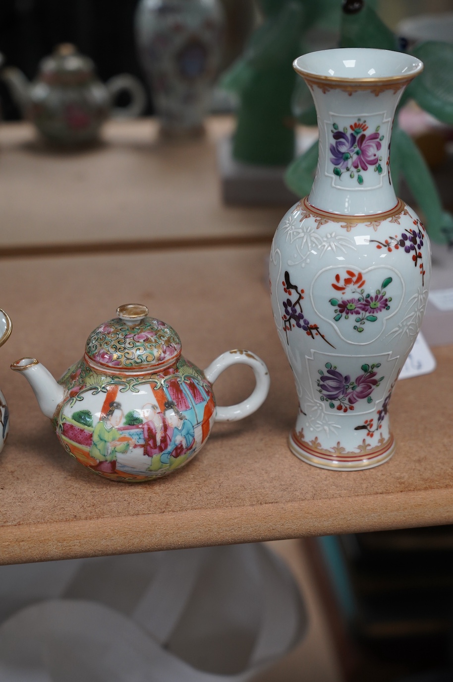 A pair of Samson armorial porcelain vases, a small Canton teapot and an armorial pot, largest 17cm high. Condition - good, teapot lid repaired